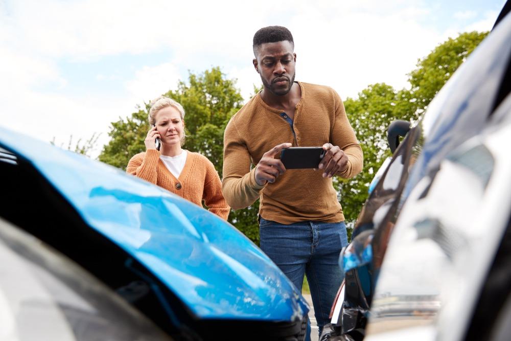 McDonough Car Accident Lawyers | Pursue Compensation Today man and woman at car accident scene