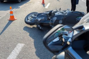 motorcycle accident in middle of road