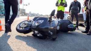 motorcycle in accident in middle of highway