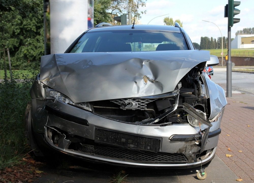 Property Damage Lawyers in Georgia | Free Case Review | 24/7/365 The front of a car is wrecked because of a collision.