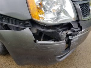 car damage after a side-swipe accident